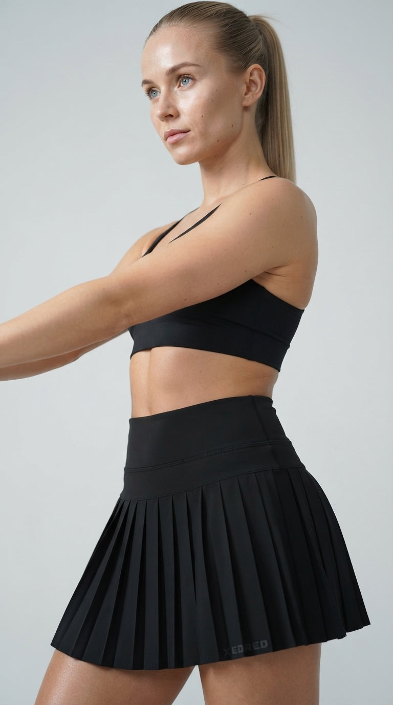 Motion™ Falda Deportiva Plisada